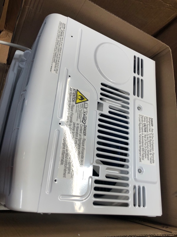 Photo 3 of **powers on, but fan does not turn and unit does not release air**
Frigidaire Window-Mounted Room Air Conditioner, 5,000 BTU, in White
