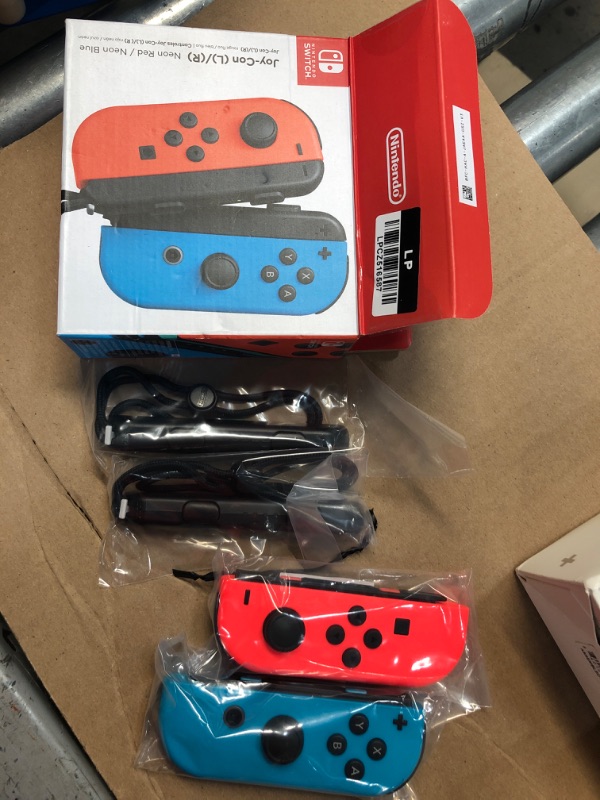 Photo 2 of Switch Joy-Con Neon Red Nintendo Switch
