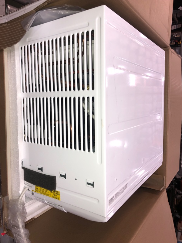 Photo 2 of NONFUNCTIONAL -Frigidaire 11,000 BTU Window Air Conditioner with Supplemental Heat and Slide Out Chassis in White