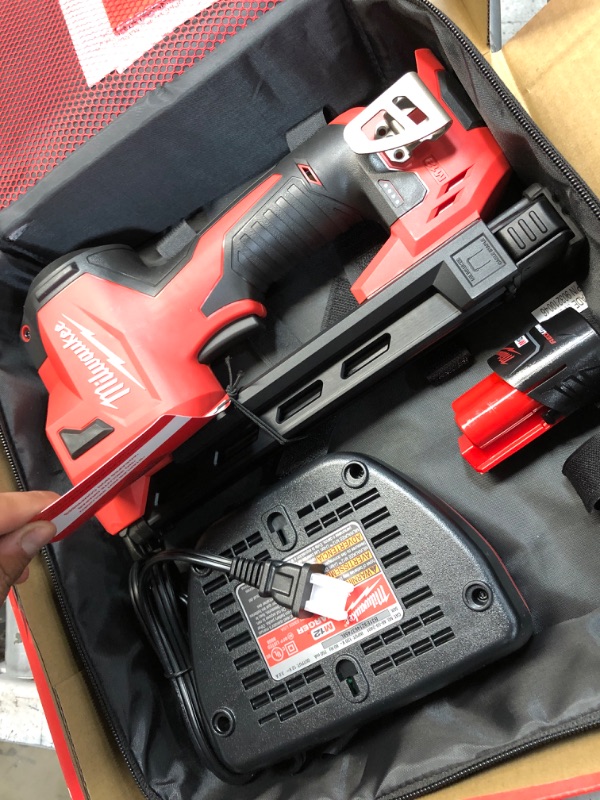 Photo 6 of Milwaukee M12 12-Volt Lithium-Ion Cordless Cable Stapler Nailer Kit with 2.0Ah Battery, Charger and Bag