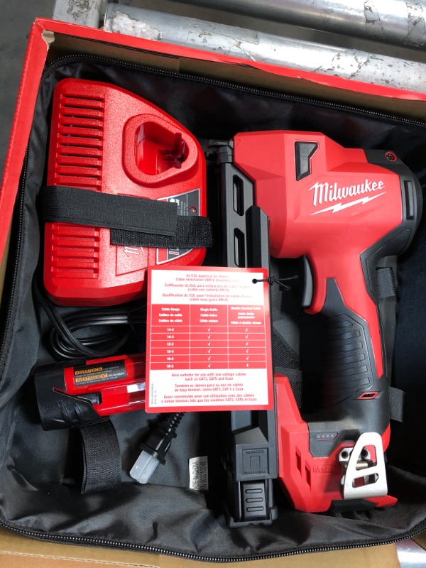 Photo 2 of Milwaukee M12 12-Volt Lithium-Ion Cordless Cable Stapler Nailer Kit with 2.0Ah Battery, Charger and Bag