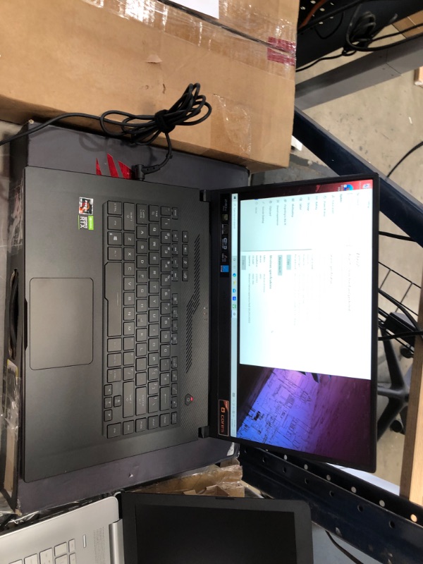 Photo 2 of ROG Zephyrus G15 Ultra Slim Gaming Laptop, 15.6” 240Hz PANTONE Validated FHD Display, GeForce RTX 2060 Max-Q, AMD Ryzen 9 4900HS, 16GB DDR4, 1TB PCI