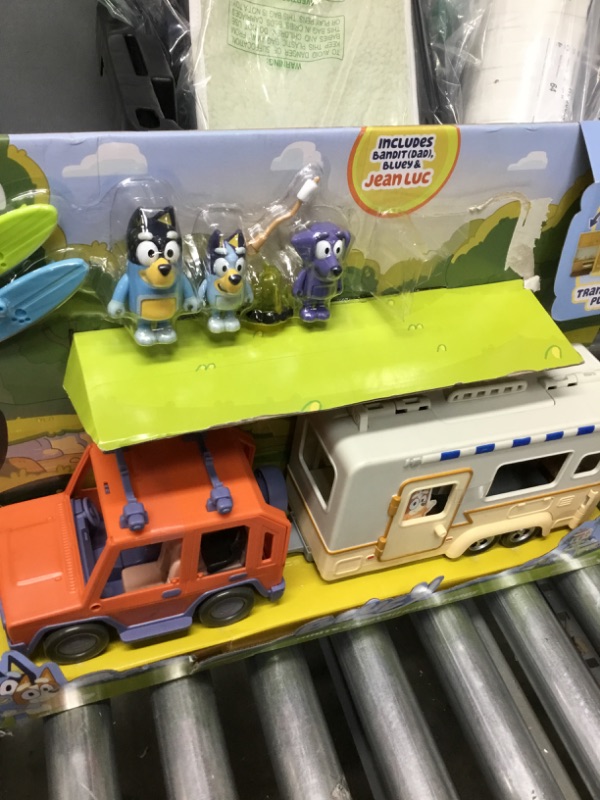 Photo 2 of Bluey Ultimate Caravan Adventures - Caravan Playset and Three 2.5-3" Figures & 4WD Family Vehicle with 2 Surfboards
