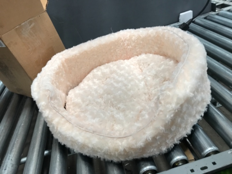 Photo 1 of Furhaven Pet Bed for Dogs and Cats - Ultra Plush Curly Fur Oval Cuddler Dog Bed with Removable Washable Cover and Pillow Cushion, Cream, Medium
