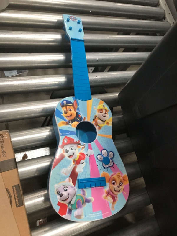 Photo 2 of First Act Paw Patrol Musical Guitar, 23.5” - Plays Paw Patrol Theme Song - Musical Instruments for Toddlers and Preschoolers - for Kids 3 and Up - Easy to Hold Guitar - Ready to Play
