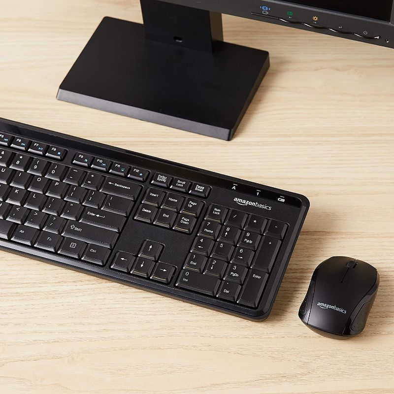 Photo 1 of Amazon Basics Wireless Computer Keyboard and Mouse Combo - Quiet and Compact - US Layout (QWERTY)
