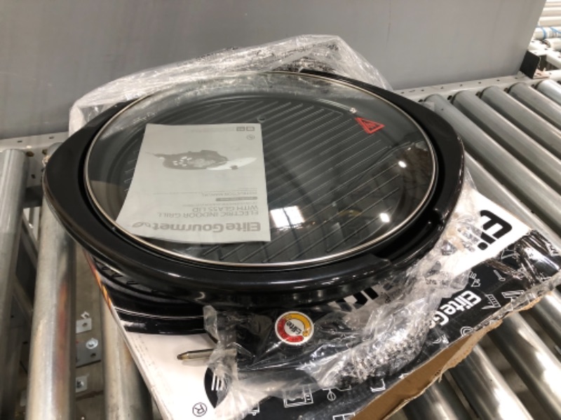 Photo 1 of USED: Elite Gourmet EMG-980B Smokeless Electric Tabletop Grill Nonstick, 6-Serving, Dishwasher Safe Removable Grilling Plate, Grill Indoor, Tempered Glass Lid, Adjustable Temperature, 14", Black 17.2 x 17 x 4.1 inches