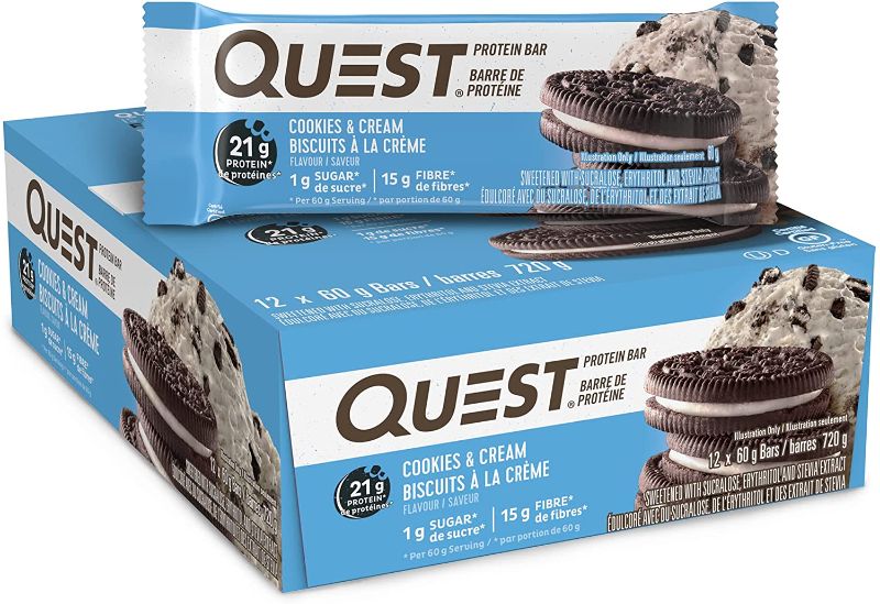 Photo 1 of EXP: 1/27/2023 
Quest Nutrition Cookies & Cream Protein Bar, High Protein, Low Carb, Gluten Free, Keto Friendly, 12 Count
