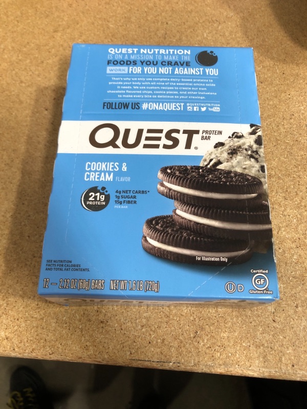 Photo 2 of EXP: 1/27/2023 
Quest Nutrition Cookies & Cream Protein Bar, High Protein, Low Carb, Gluten Free, Keto Friendly, 12 Count
