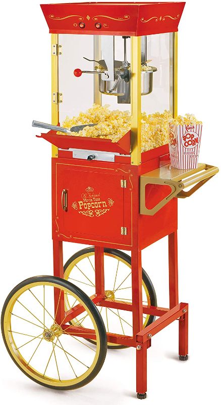 Photo 1 of ** HARDWARE MIGHT BE MISSING**
** DIRTY **
 Nostalgia Popcorn Maker Professional Cart, 8 Oz Kettle Makes Up to 32 Cups, Vintage Movie Theater Popcorn Machine with Interior Light, Measuring Spoons and Scoop, Red
17.5 x 24.5 x 53 inches
