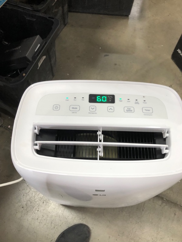 Photo 2 of LG 6,000 BTU (DOE) / 8,000 BTU (ASHRAE) Portable Air Conditioner, Cools 250 Sq.Ft. (10' x 25' room size), Quiet Operation, LCD Remote, Window Installation Kit Included, 115V