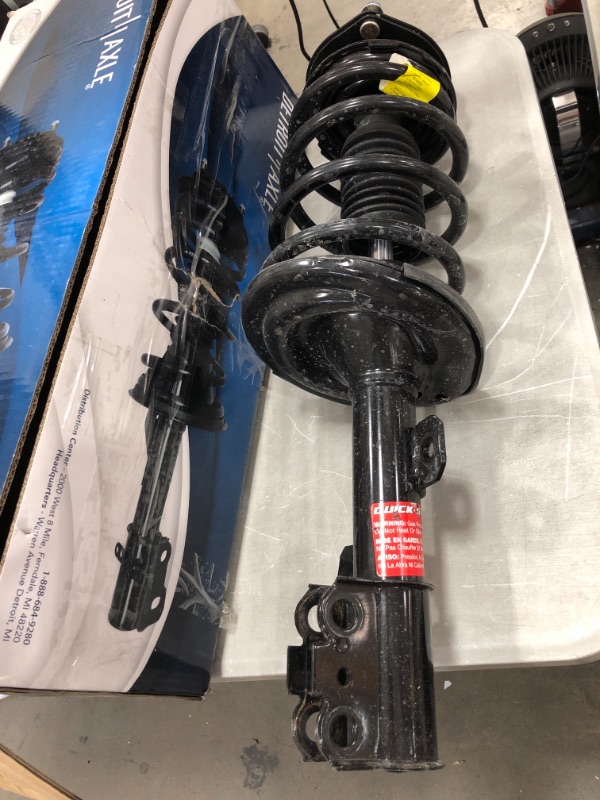 Photo 2 of **MINOR DAMAGE** Detroit Axle - Front Strut w/Coil Spring Replacement PART # 432206**SINGLE RIGHT SIDE**