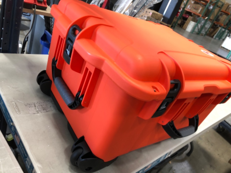 Photo 5 of **MISSING HARDWARE TO ONE WHEEL** Nanuk 960 Waterproof Hard Case with Wheels and Foam Insert - Orange
