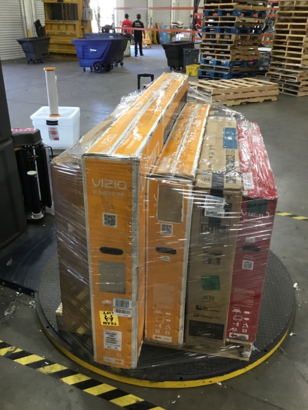 Photo 1 of PALLET  OF DAMAGED TVS SOLD AS IS NON REFUNDABLE