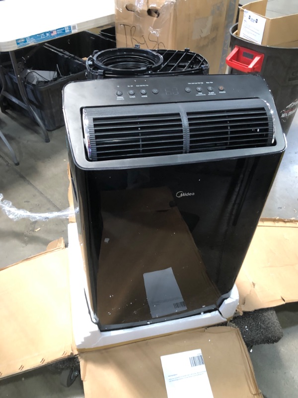 Photo 2 of **PARTS ONLY**
Midea Duo 12,000 BTU(10,000 BTU SACC)Ultra Quiet Smart HE Inverter Portable Air Conditioner,Dehumidifier,and Fan-Cools Upto 450 Sq.ft,Works with Alexa
