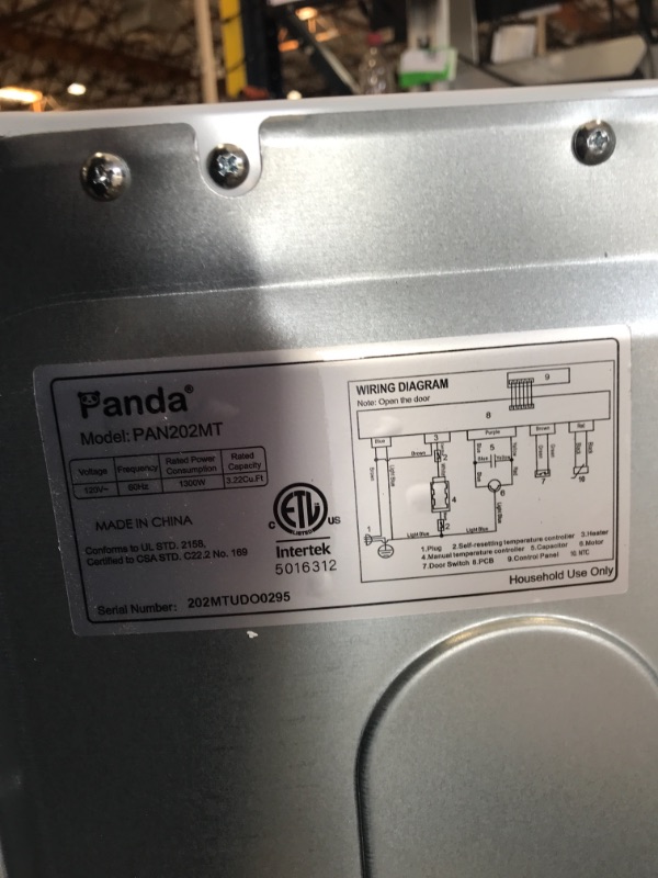 Photo 2 of ***DAMAGE SHOWN IN PICTURE*** Panda 24 in. 3.22 Cu. Ft. Vented Compact Portable Electric Dryer in White
