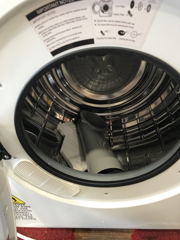 Photo 3 of ***DAMAGE SHOWN IN PICTURE*** Panda 24 in. 3.22 Cu. Ft. Vented Compact Portable Electric Dryer in White
