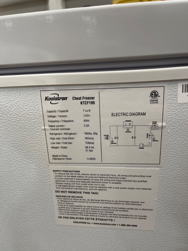 Photo 1 of ***TURNS ON BUT HAS A NOISE WHEN RUNNING, DAMAGE SHOWN IN PICTURE*** KTCF195 38" Chest Freezer with 6.9 Cu. Ft. Capacity Defrost Drain Adjustable Thermostat Metal Backboard Removable Storage Basket in
