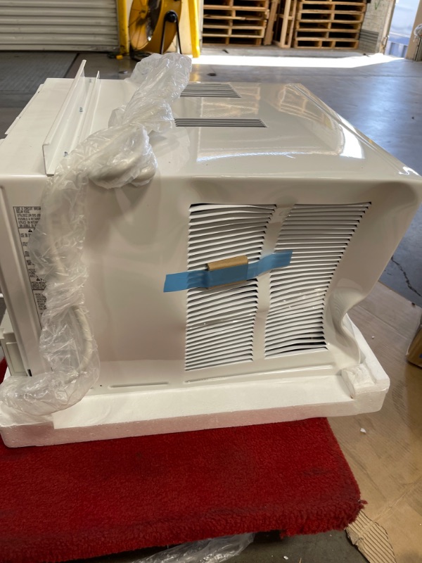 Photo 3 of ***DAMAGE SHOWN IN PICTURE*** LW8021HRSM 19" Smart Window Air Conditioner with 7500 BTU Cooling Capacity 3850 BTU Heating Capacity Remote Control and 2 Fan Speeds in White - 115
