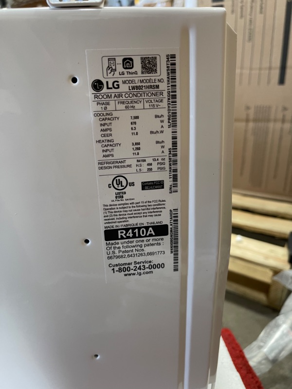Photo 2 of ***DAMAGE SHOWN IN PICTURE*** LW8021HRSM 19" Smart Window Air Conditioner with 7500 BTU Cooling Capacity 3850 BTU Heating Capacity Remote Control and 2 Fan Speeds in White - 115
