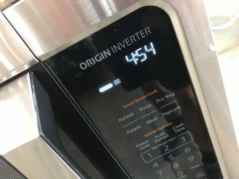 Photo 4 of (DENTED CORNER/SIDE)
Toshiba ML-EM45PIT(SS) Microwave Oven with Origin Inverter Technology, LCD Display and Smart Sensor, 1.6 Cu.ft, Stainless Steel