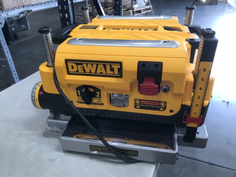 Photo 5 of (MISSING METAL STRIPS AS SEEN IN STOCK PIC)
DEWALT Thickness Planer, Two Speed, 13-Inch (DW735X)
