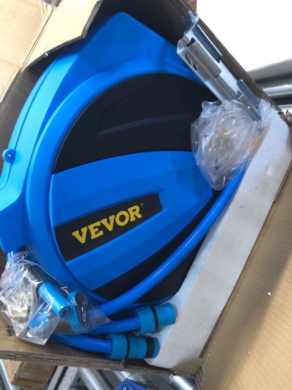 Photo 1 of VEVOR Retractable Hose Reel, 1/2 inch x 100 ft, Any Length Lock & Automatic Rewind Water Hose, Wall Mounted Garden Hose Reel w/ 180° Swivel Bracket and 8 Pattern Hose Nozzle, Blue
