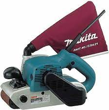 Photo 1 of Makita 9403 4" x 24" Belt Sander with Cloth Dust Bag and 4-Inch x 24-Inch Abrasive Sanding Belt, 80 Grit (10/Pk)
