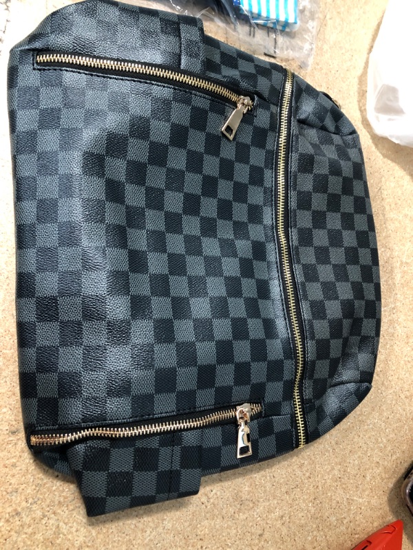 Photo 1 of Black and Grey Checkered Mini Backpack 