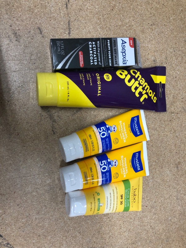 Photo 1 of **NO REFUNDS/RETURNS** Bundle of Assorted Lotion, face mask, sunscreen 
