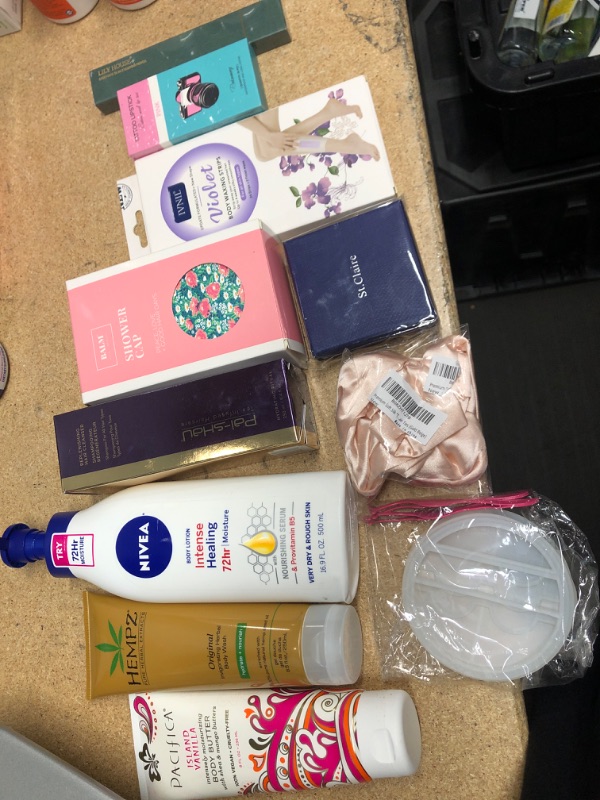 Photo 1 of **NO REFUNDS/RETURNS** Bundle of Assorted SELF CARE LOTION, Waxing strips, body wash, etc. 
