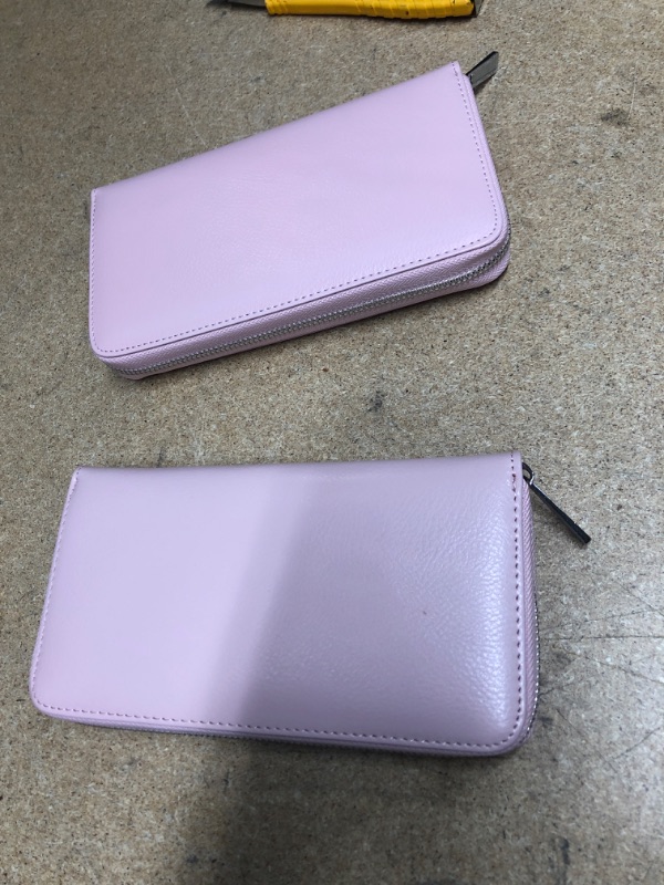 Photo 1 of 




2 light pink wallets 


