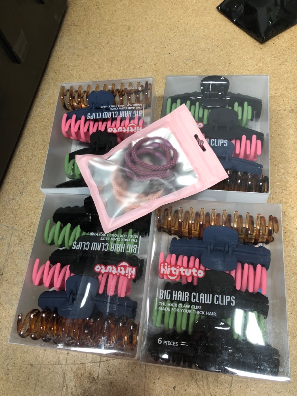 Photo 1 of NON REFUNDABLE ASSORTMENT OF AMAZON GOODS 
hair bundle 
big hair claw clips and hair bands 
