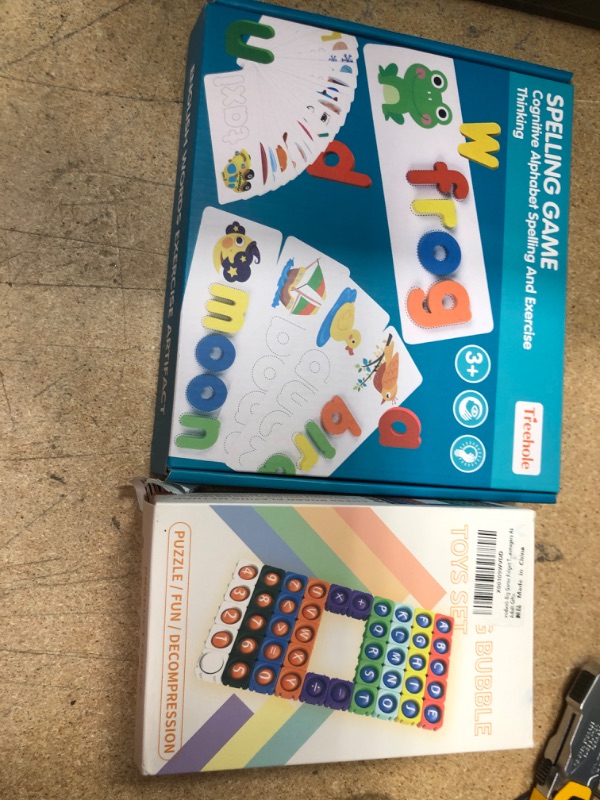 Photo 1 of children learning bundle 
spelling bubble toy set and spelling game 