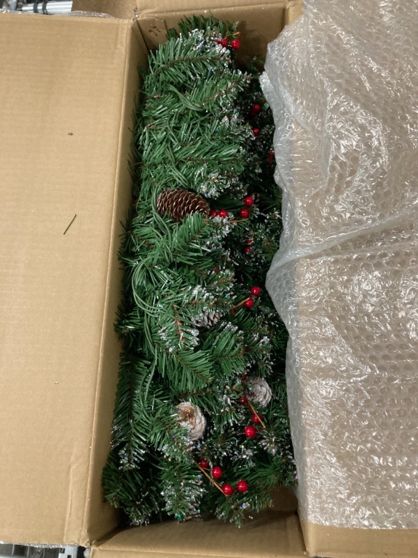 Photo 2 of National Tree Company Pre-lit Artificial Christmas Garland | Flocked with Mixed Decorations and White Lights | Glittery Mountain Spruce - 9 ft
