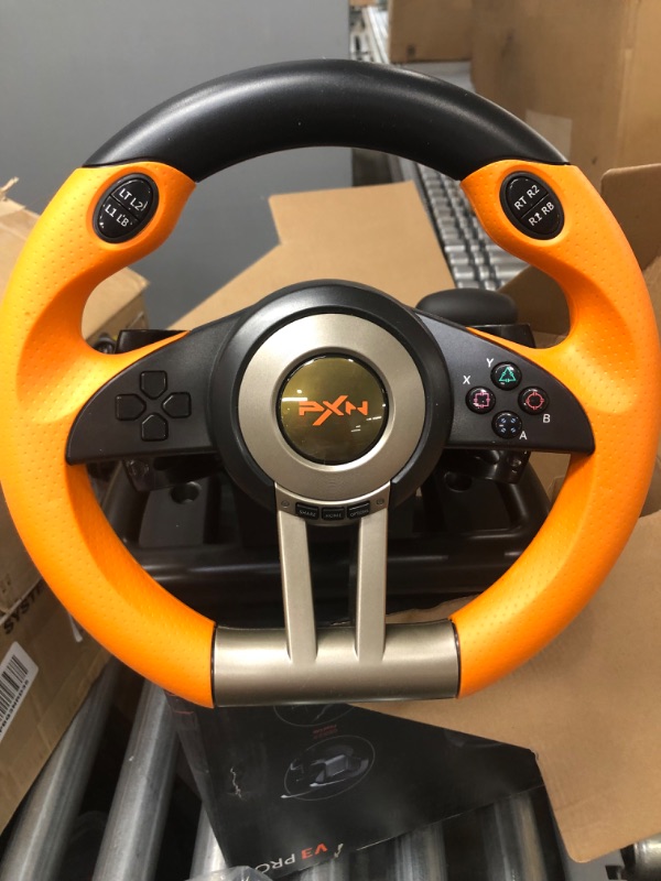 Photo 3 of PC Racing Wheel, PXN V3II 180 Degree Universal USB Car Sim Game Steering Wheel with Pedals for PS3, PS4, Xbox One,Xbox Series X/S,Nintendo Switch (Orange)
