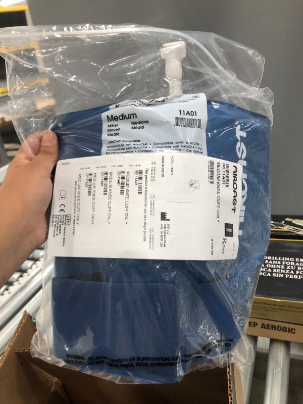 Photo 1 of Aircast Cryo/Cuff System, Combines Focused Compression with Cold Therapy to Provide Optimal Control of Swelling to Minimize Hemarthrosis, Edema and Pain, Complete System with Medium Knee Cuff, Blue
