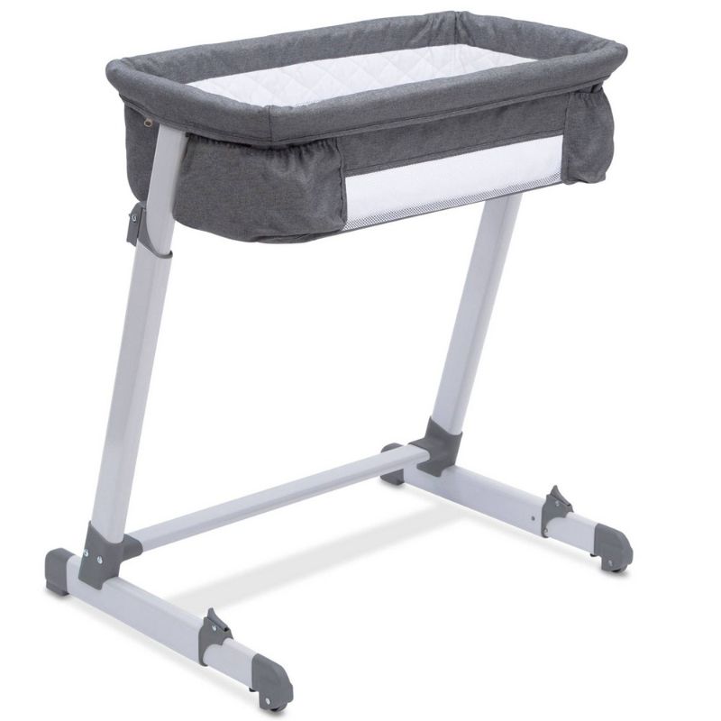 Photo 1 of Delta Children by the Bed Deluxe Sleeper Bassinet in Grey
