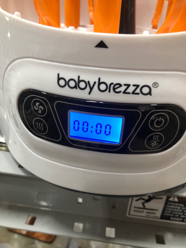 Photo 3 of Baby Brezza Baby Bottle Sterilizer and Dryer Machine – Electric Steam Sterilization - Universal Fit - Pacifiers, Glass, Plastic, and Newborn Feeding Bottles
