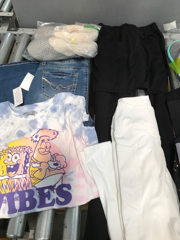 Photo 1 of **NON REFUNDABLE*** SOLD AS IS
Bundle of Womens clothing and accessories 
sizes: shirts: Large
pants: 4, L, 9L
shoes: XL, M