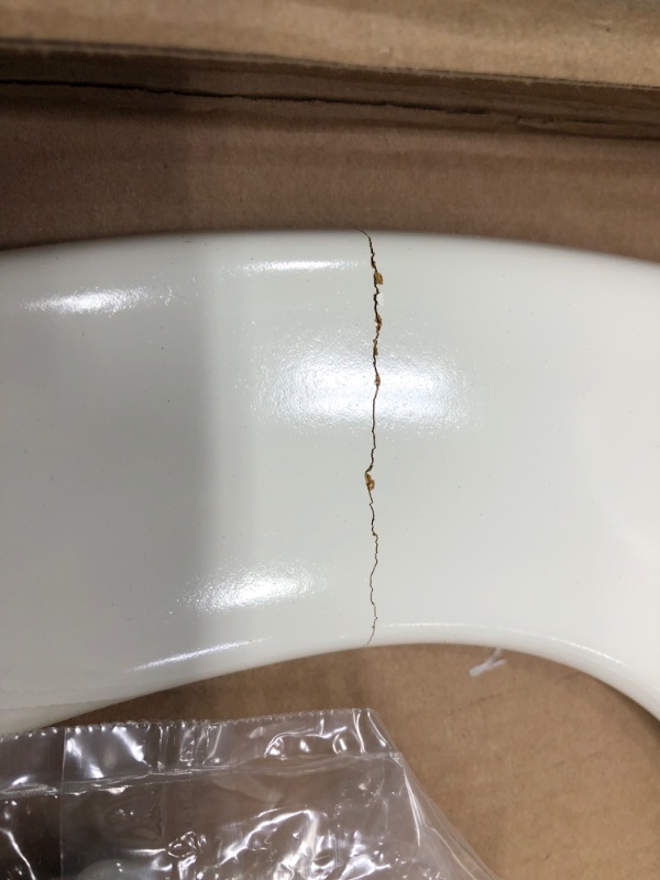 Photo 3 of Bemis 1500EC Elongated Wood Toilet Seat Biscuit
- Minor crack on seat (See photos) 