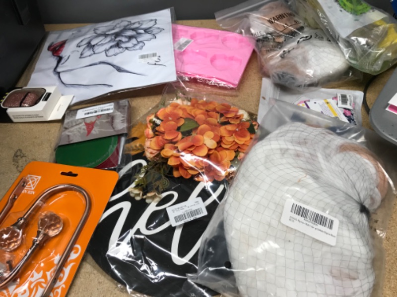 Photo 1 of **NOT REFUNDABLE** BUNDLE OF ASSORTED ITEMS ( WIGS, AIRPOD CASE, CHOCOLATE MOLDS ETC..)