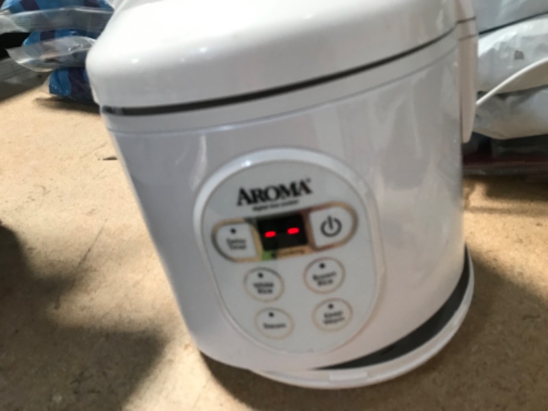 Photo 3 of (DAMAGED BOTTOM)
8-Cup White Digital Rice Cooker in Black Control Panel

