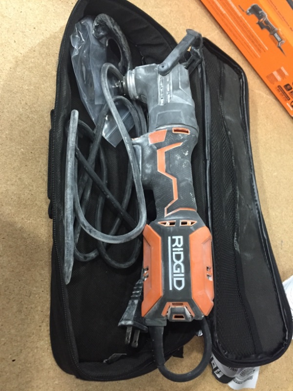 Photo 2 of **TESTED AND FUNCTIONS** RIDGID 4 Amp Corded Oscillating Multi-Tool
