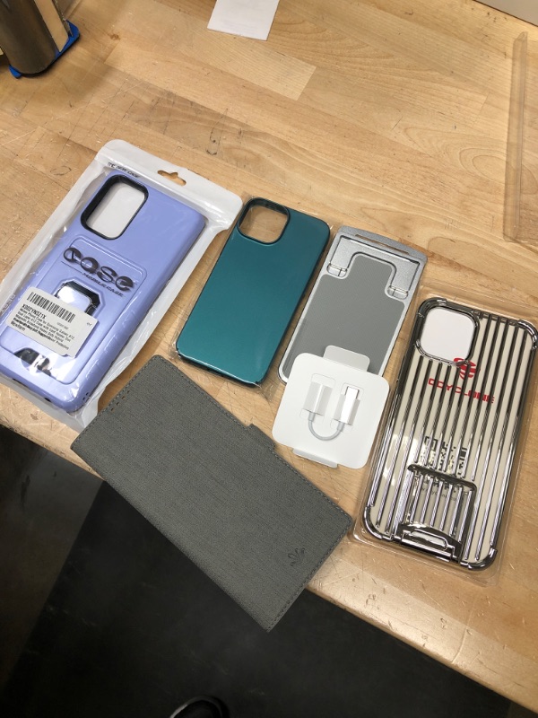 Photo 1 of MOBILE PHONE BUNDLE (INCLUDES CASES FOR DIFFERENT PHONES) 