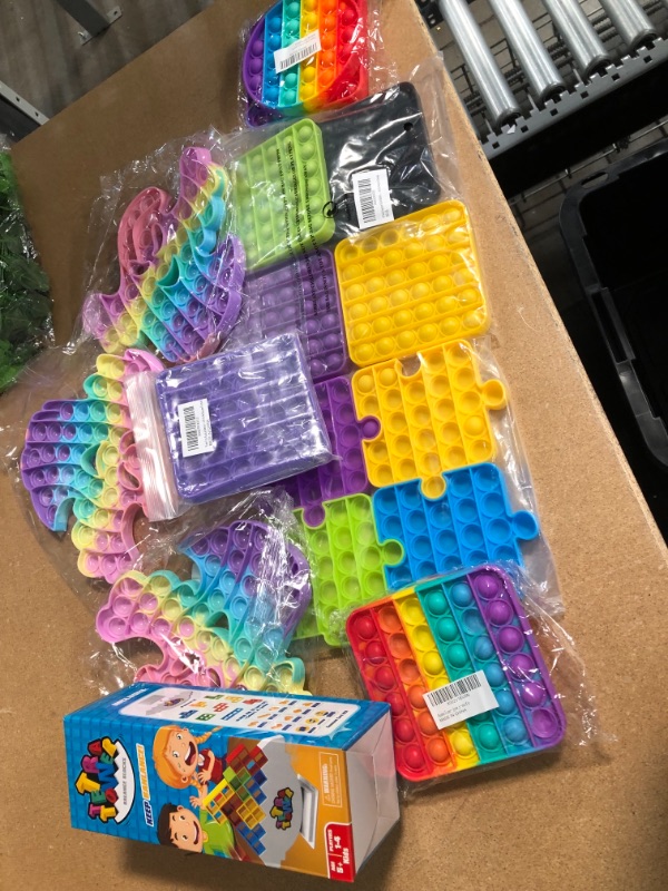 Photo 1 of BAG OF ASSORTED POP FIDGETS 
**SOLD AS IS, NOT REFUNDABLE**