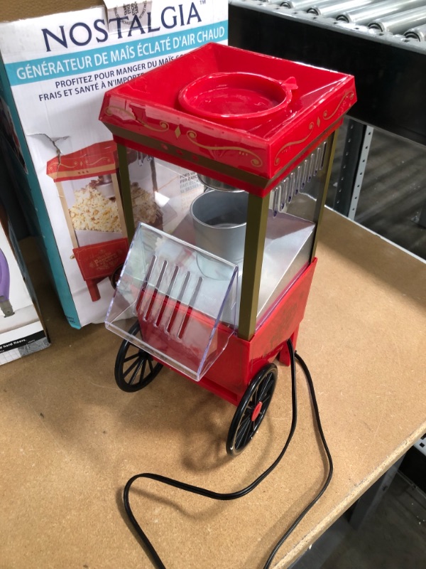 Photo 2 of *USED*
*SEE last picture for damage*
Nostalgia OFP-501 Old Fashioned Popcorn Machine, 1040 W, 120 V, 12 Cup, Red
