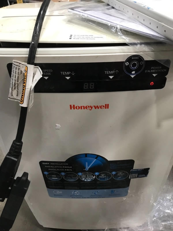 Photo 2 of **MINOR WARE** Honeywell 10,000 BTU Portable Air Conditioner with Dehumidifier & Fan
