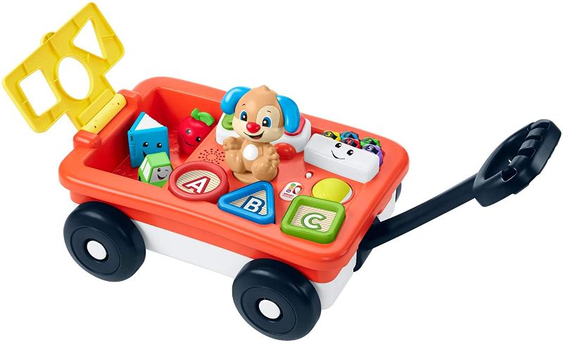 Photo 1 of Fisher-Price Laugh & Learn Pull & Play Learning Wagon, pull-toy wagon with music, lights, and learning songs for babies & toddlers ages 6-36 months
