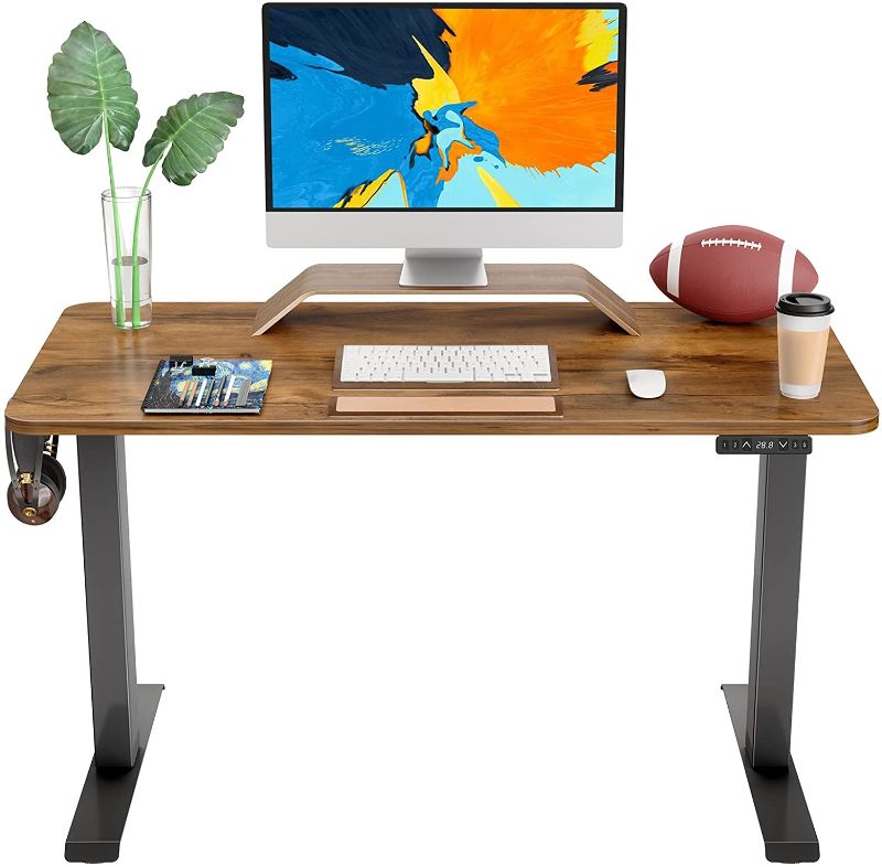 Photo 1 of FAMISKY Standing Desk Dual Motors, Adjustable Height Electric Stand up Desk, 40 x 24 Inches Sit Stand Home Office Desk, Ergonomic Workstation Black Steel Frame/Rustic Brown Wood Tabletop